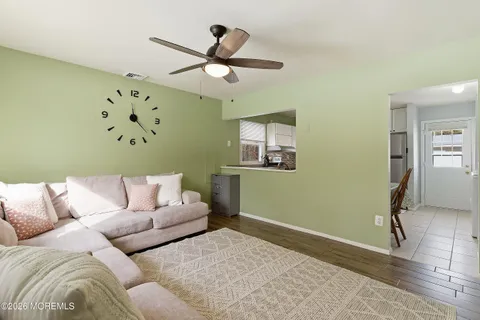 a living room with furniture and a window