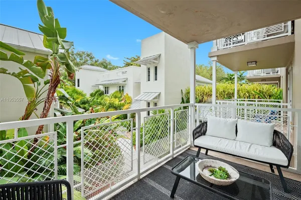a view of a porch with furniture