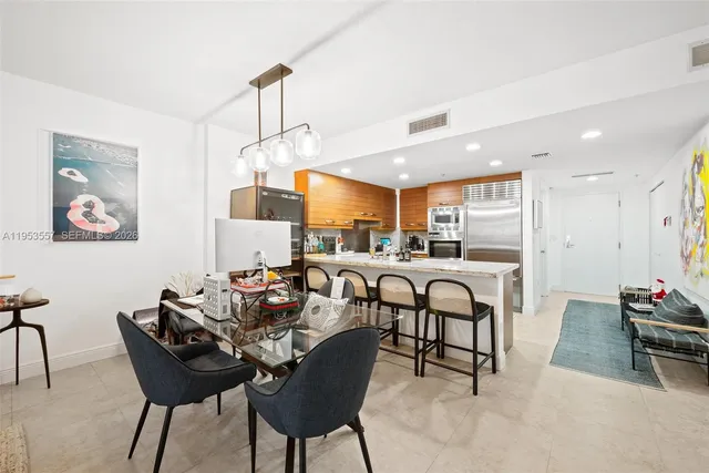 a view of a dining room with furniture