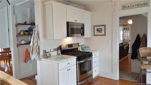 a kitchen with a cabinets and a stove