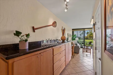 a kitchen with stainless steel appliances a sink and cabinets