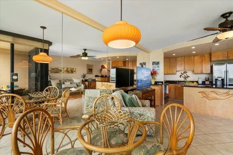 a living room with lots of furniture and a flat screen tv