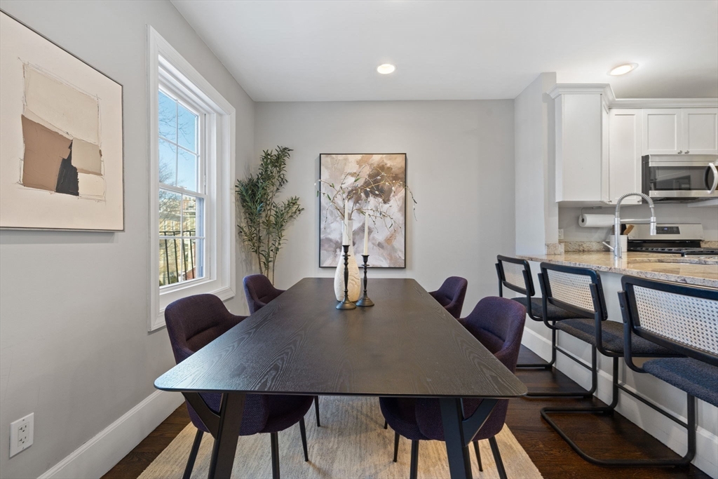 20 Sullivan Street, Unit 2 Boston, MA 02129 - Photo 11 of 25 a view of a dining room with furniture and wooden floor