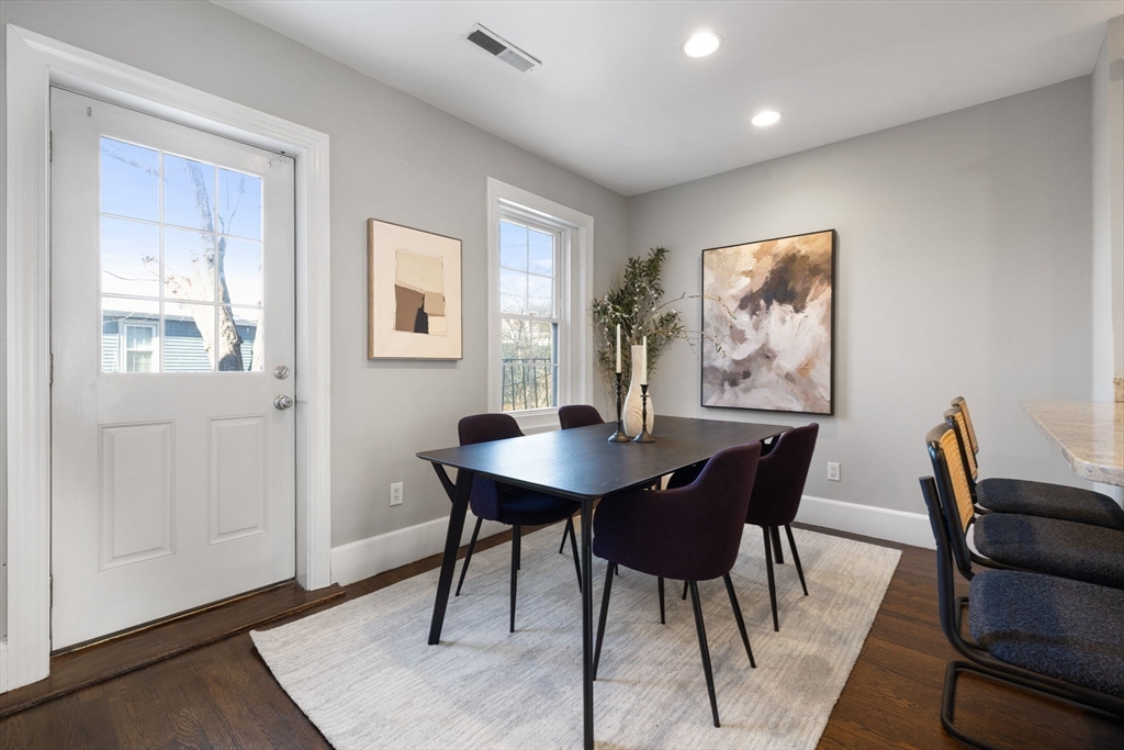 20 Sullivan Street, Unit 2 Boston, MA 02129 - Photo 12 of 25 a view of a dining room with furniture and wooden floor