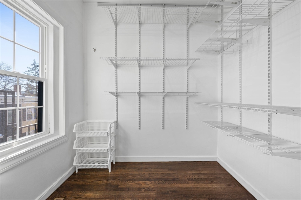 20 Sullivan Street, Unit 2 Boston, MA 02129 - Photo 17 of 25 a view of empty room with wooden floor