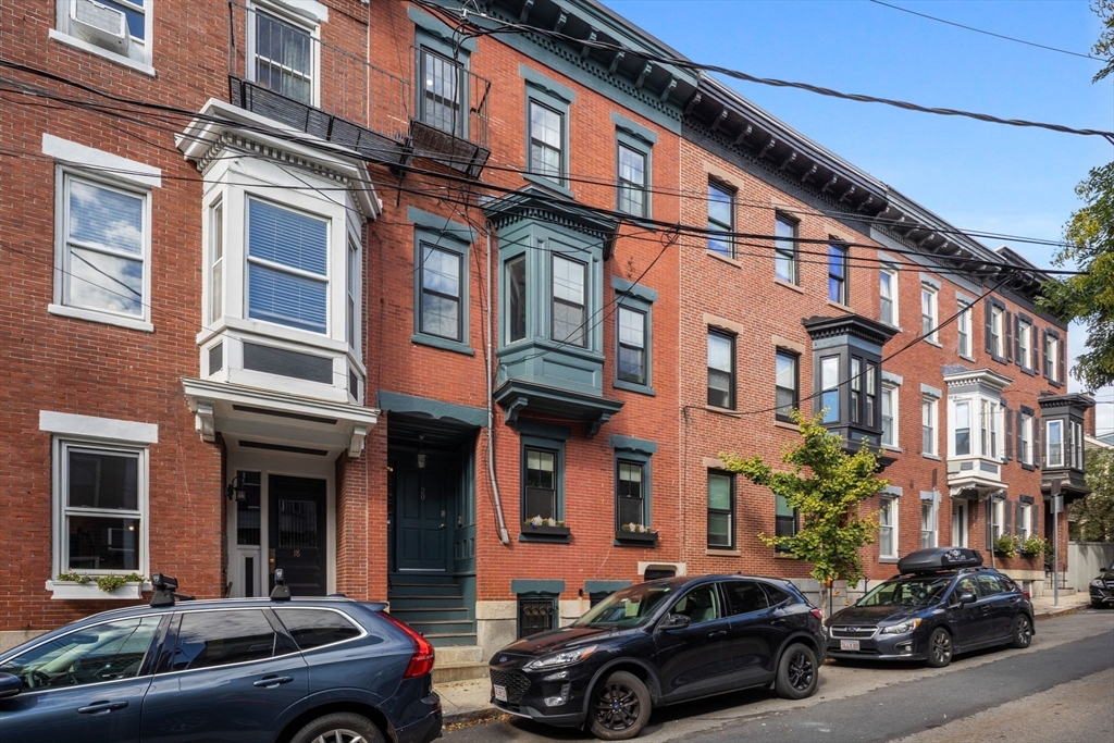 20 Sullivan Street, Unit 2 Boston, MA 02129 - Photo 23 of 25 a car parked in front of a building