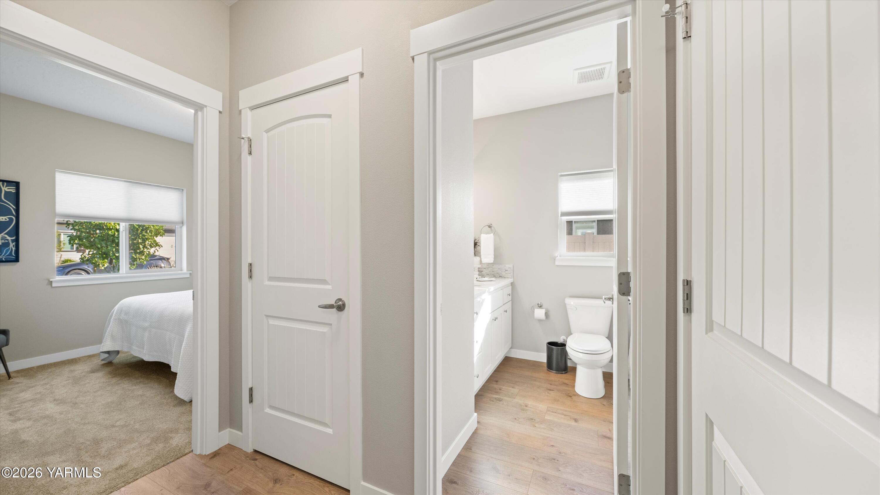 208 Bratton Street Prosser, WA 99350 - Photo 19 of 36 a view of a bathroom with a toilet and a view of bathroom