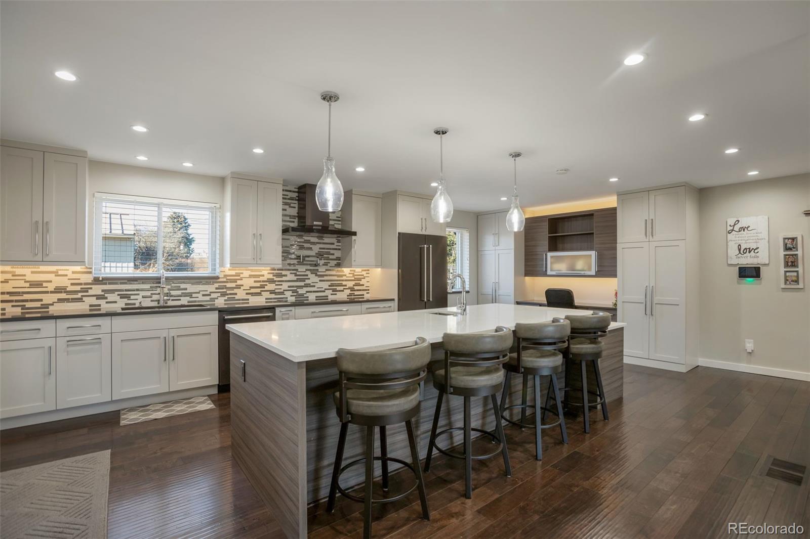 6221 South Logan Court Centennial, CO 80121 - Photo 5 of 30 a kitchen with cabinets and counter space