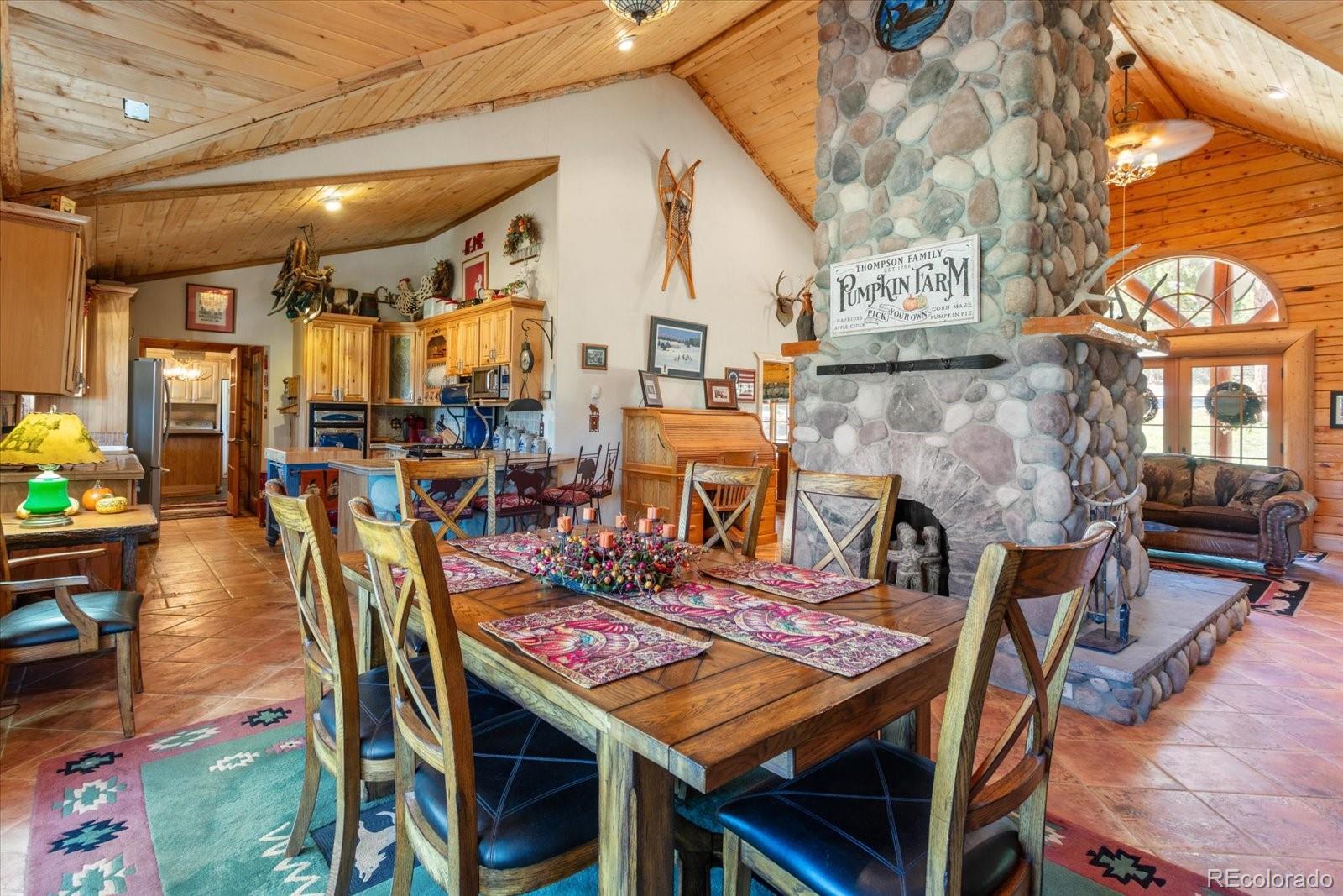 234 Bremer Road Howard, CO 81233 - Photo 13 of 50 a view of a dining room with furniture and wooden floor