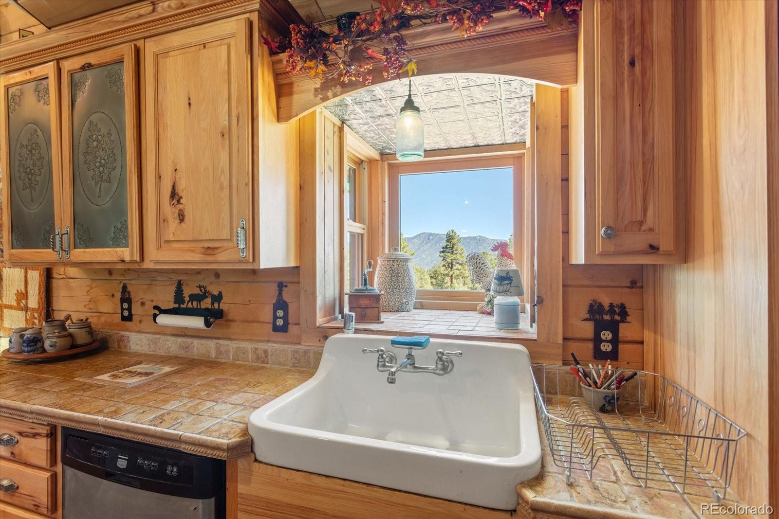 234 Bremer Road Howard, CO 81233 - Photo 20 of 50 a bathroom with tub sink and window