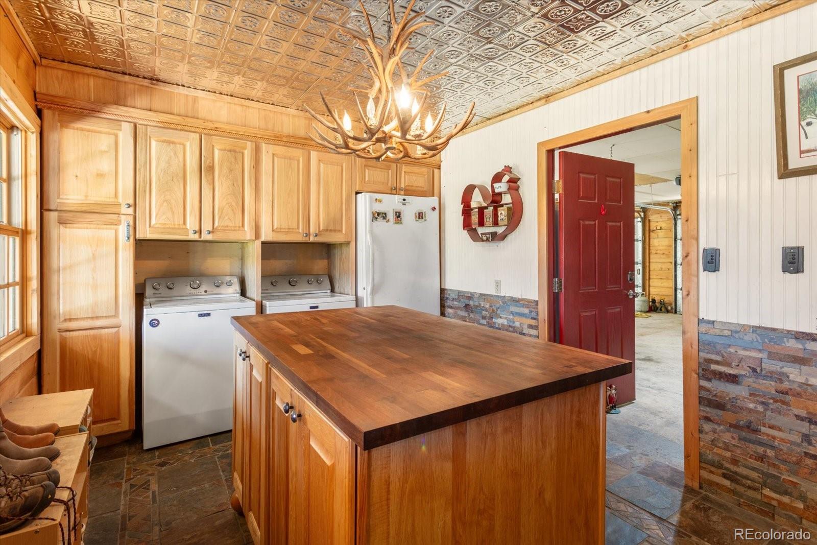 234 Bremer Road Howard, CO 81233 - Photo 31 of 50 a view of a kitchen with a sink and refrigerator