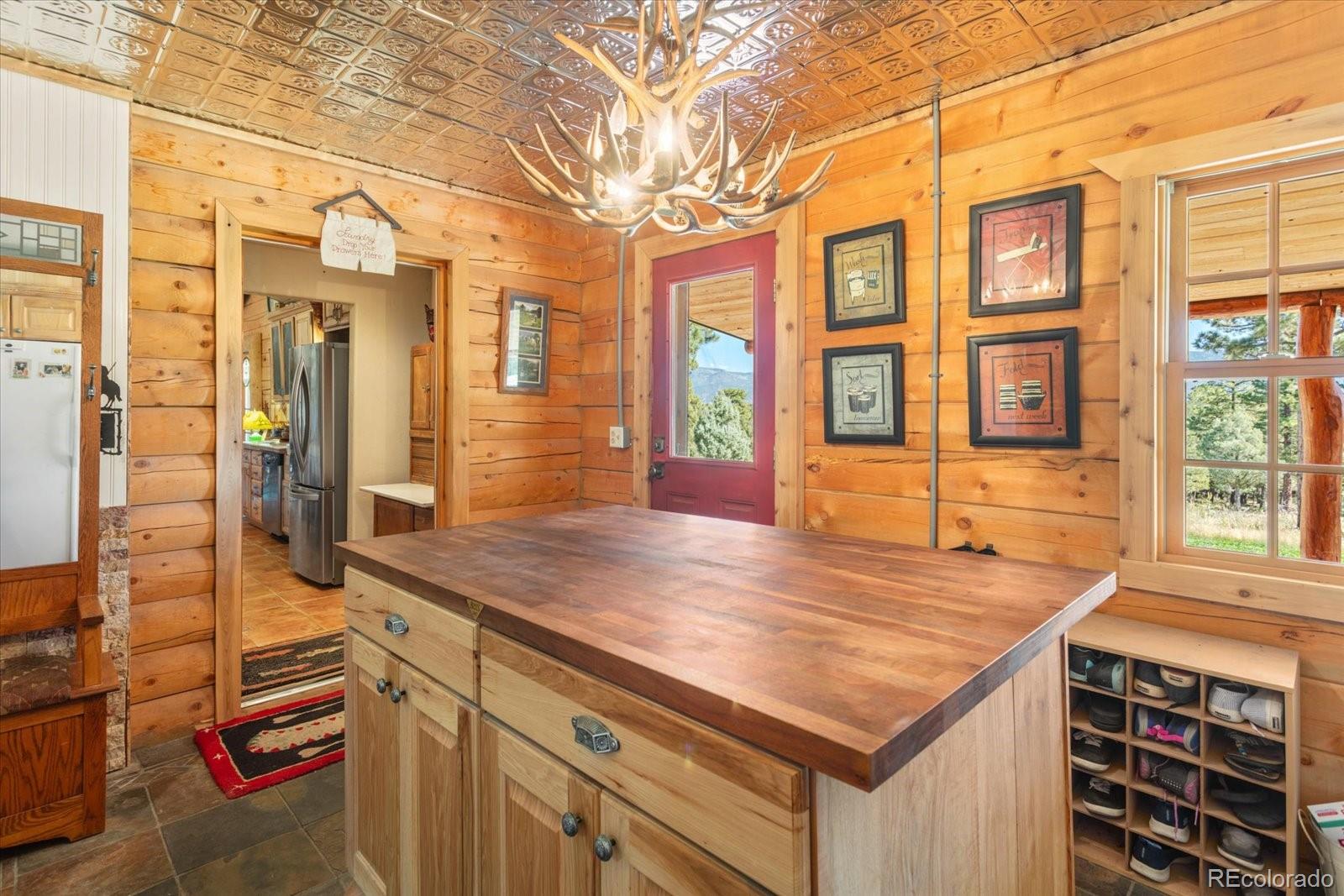 234 Bremer Road Howard, CO 81233 - Photo 32 of 50 a view of a brick buildings with many windows