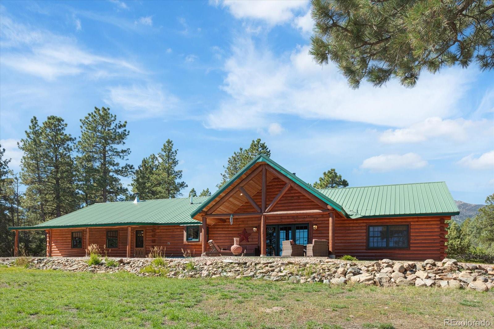 234 Bremer Road Howard, CO 81233 - Photo 34 of 50 a front view of a house with garden