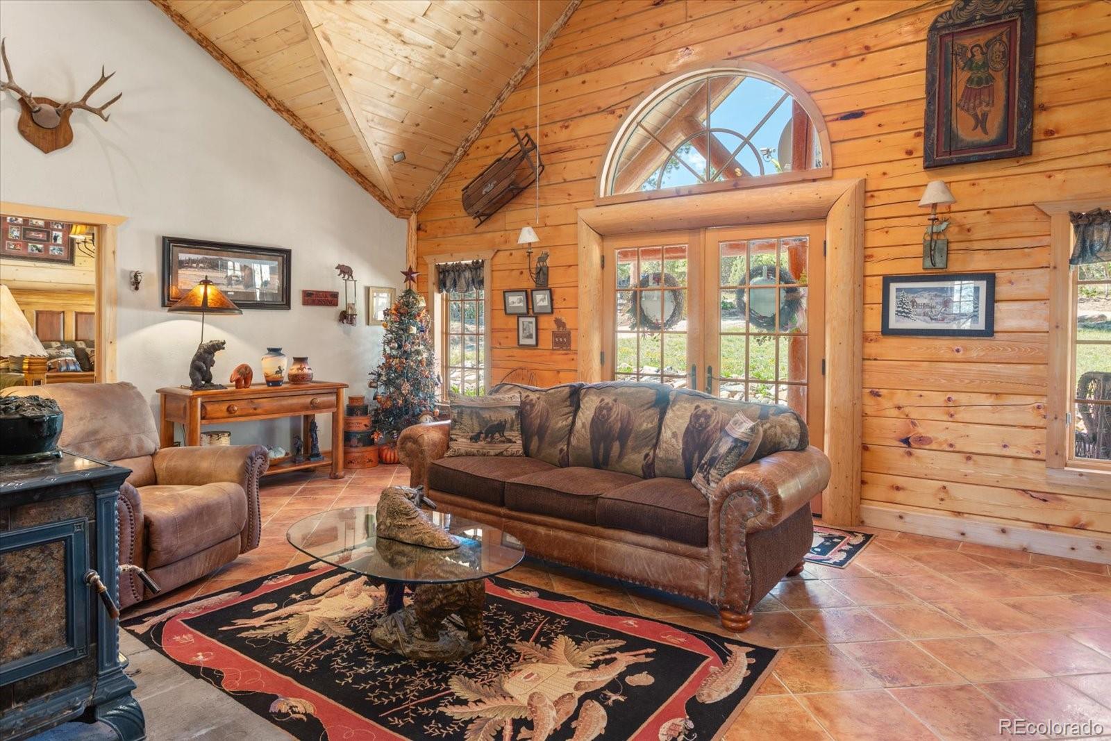 234 Bremer Road Howard, CO 81233 - Photo 10 of 50 a living room with furniture a rug and a window