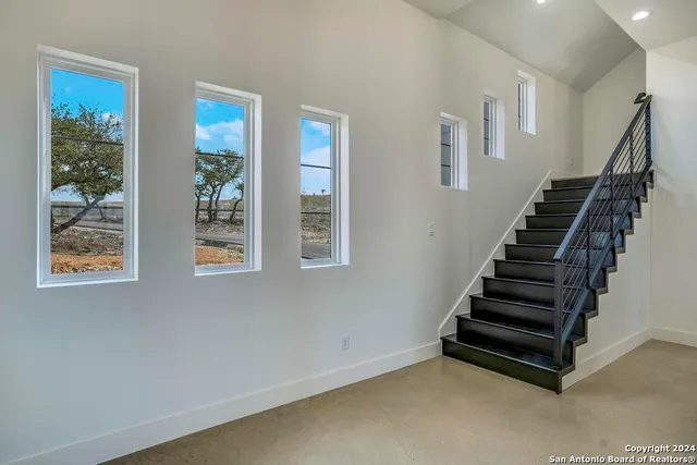 a view of an entryway with stairs