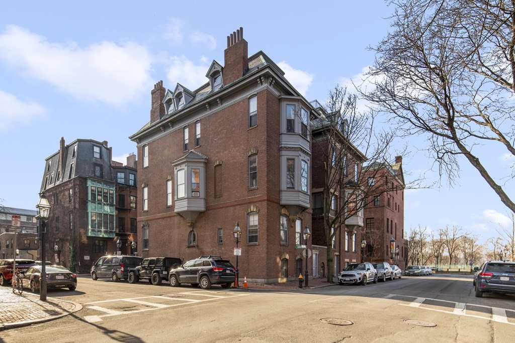 1 Otis Place Boston, MA 02108 - Photo 2 of 22 a view of a street with cars