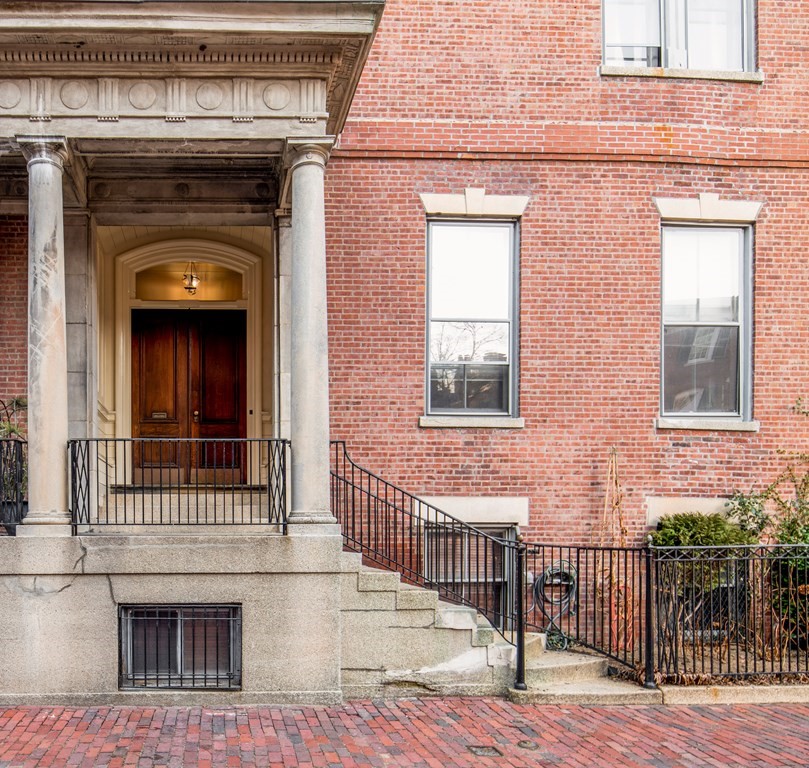 1 Otis Place Boston, MA 02108 - Photo 3 of 22 a view of front door of house with stairs