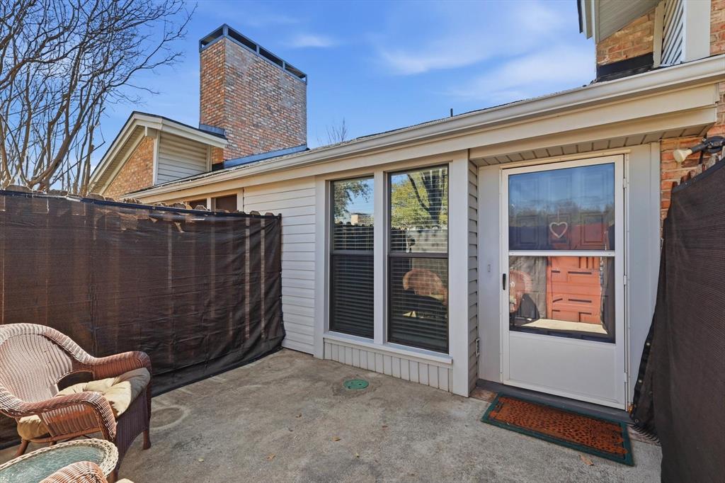 2505 Shady Ridge Drive Bedford, TX 76021 - Photo 12 of 15 a backyard of a house with sofas