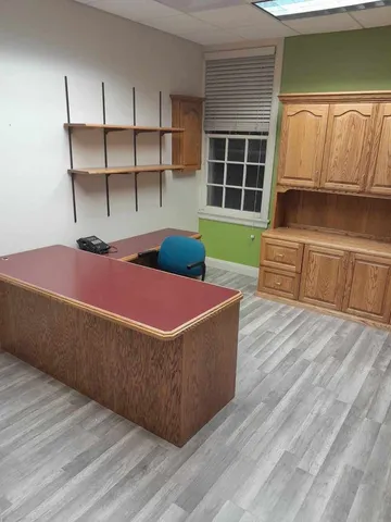 a kitchen with stainless steel appliances a refrigerator sink and cabinets