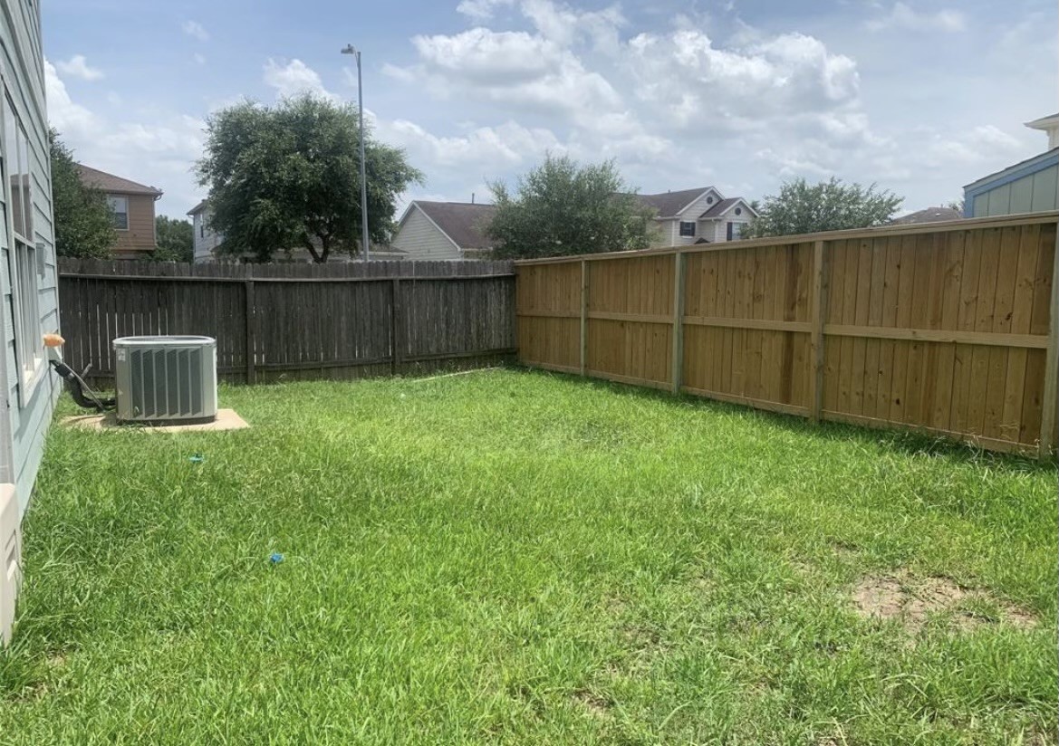8154 Arrington Forest Lane Humble, TX 77338 - Photo 9 of 10 a view of a backyard