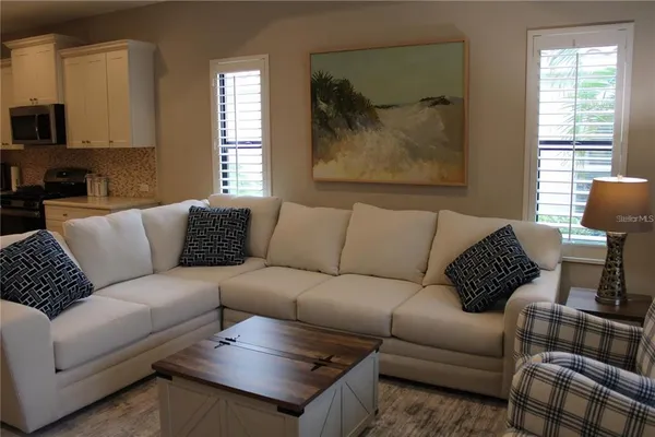 a living room with furniture and a couch