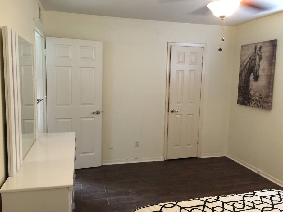 3942 West Alabama Street, Unit 5 Houston, TX 77027 - Photo 7 of 28 a view of a bathroom with wooden floor