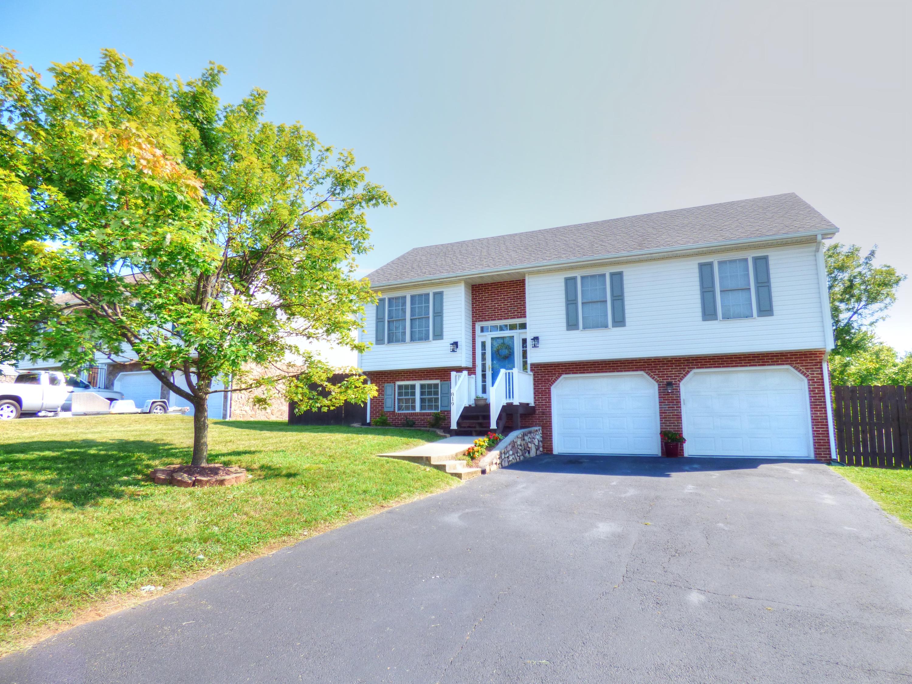 819 Ruddell Road Vinton, VA 24179 - Photo 1 of 22 a house view with a garden space