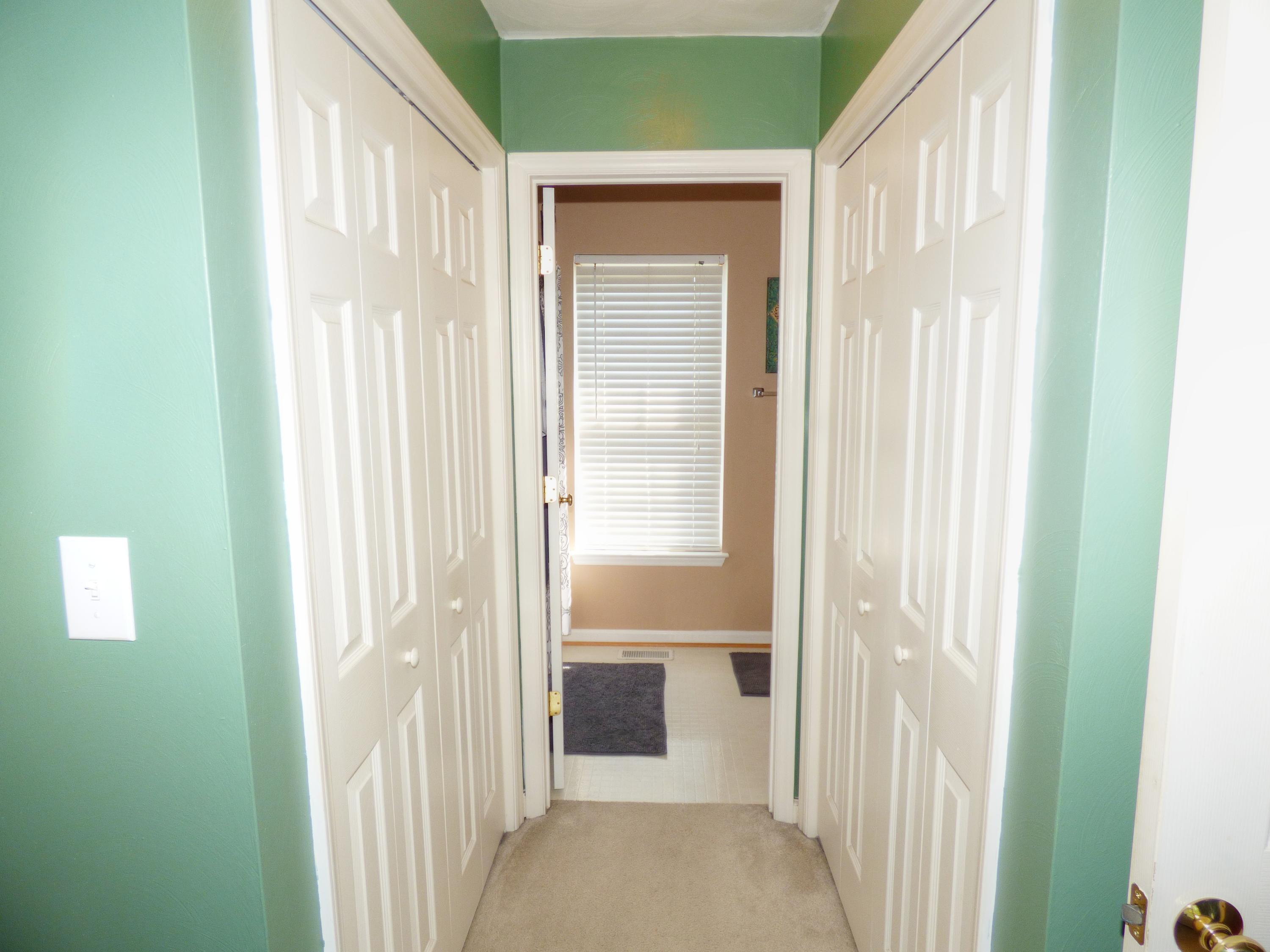 819 Ruddell Road Vinton, VA 24179 - Photo 14 of 22 a view of a bathroom from a corridor