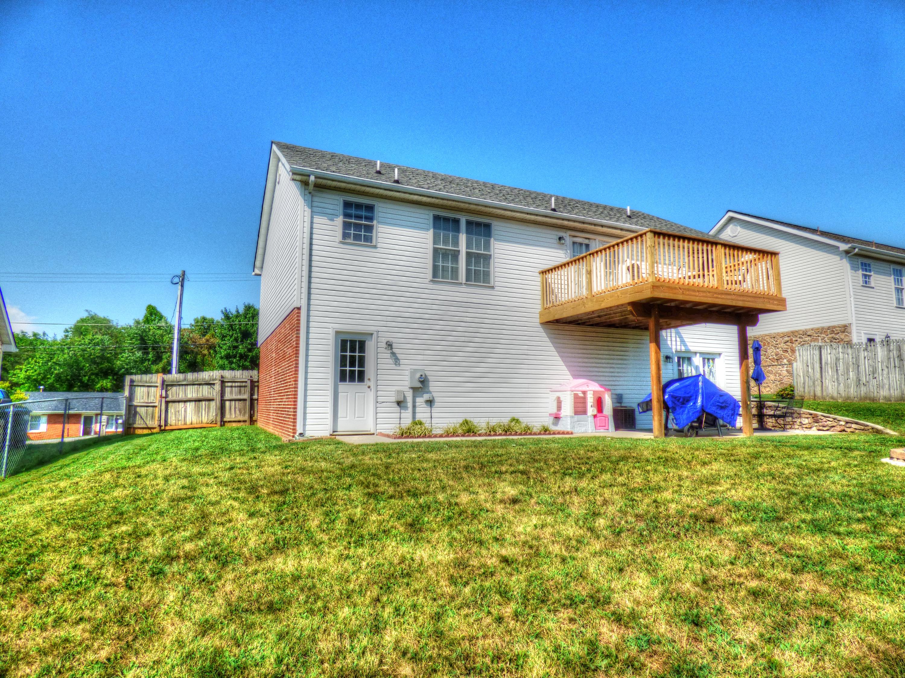 819 Ruddell Road Vinton, VA 24179 - Photo 4 of 22 a view of a house with a yard and sitting area