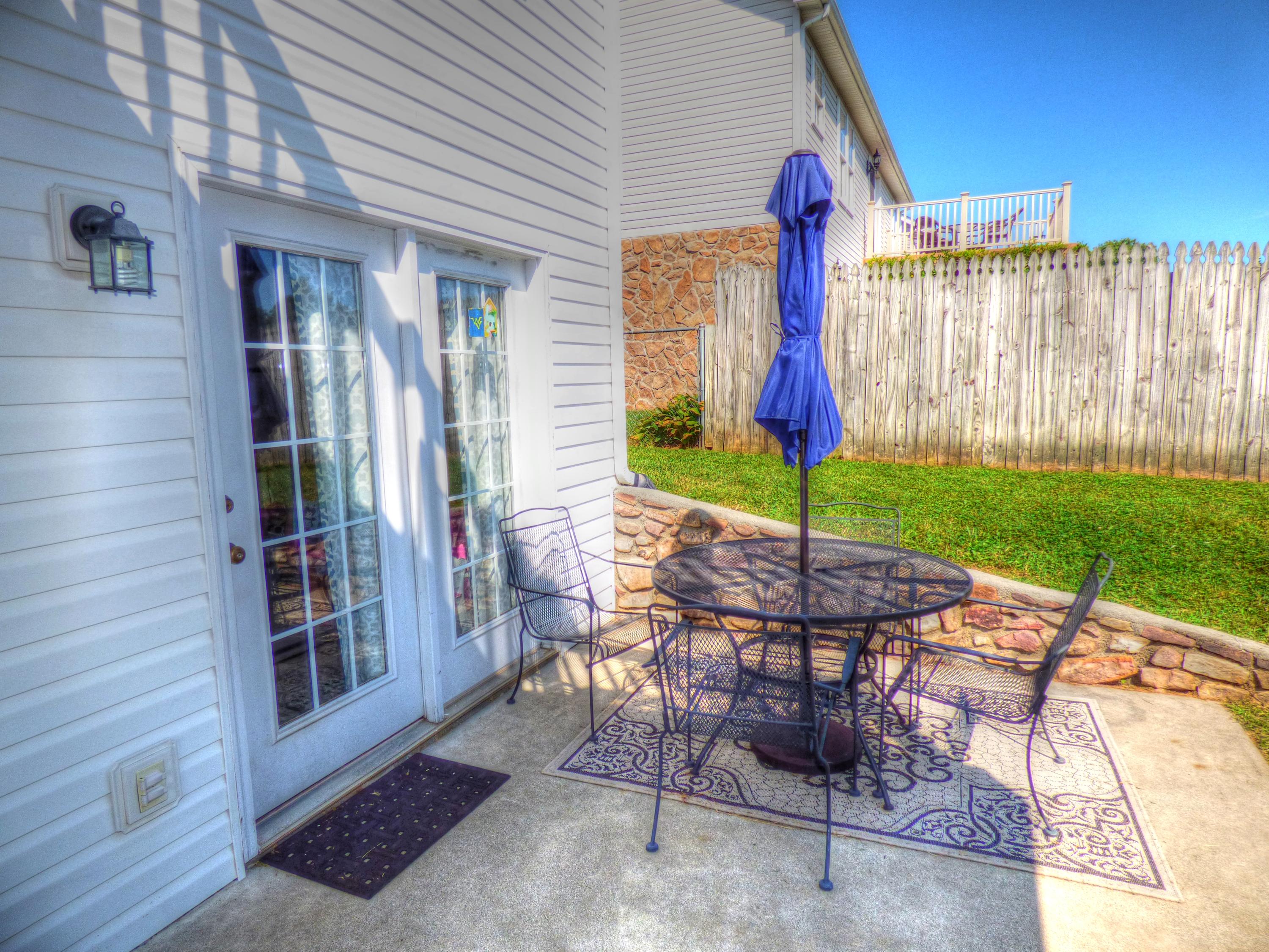 819 Ruddell Road Vinton, VA 24179 - Photo 8 of 22 a view of a chairs and table in backyard of the house