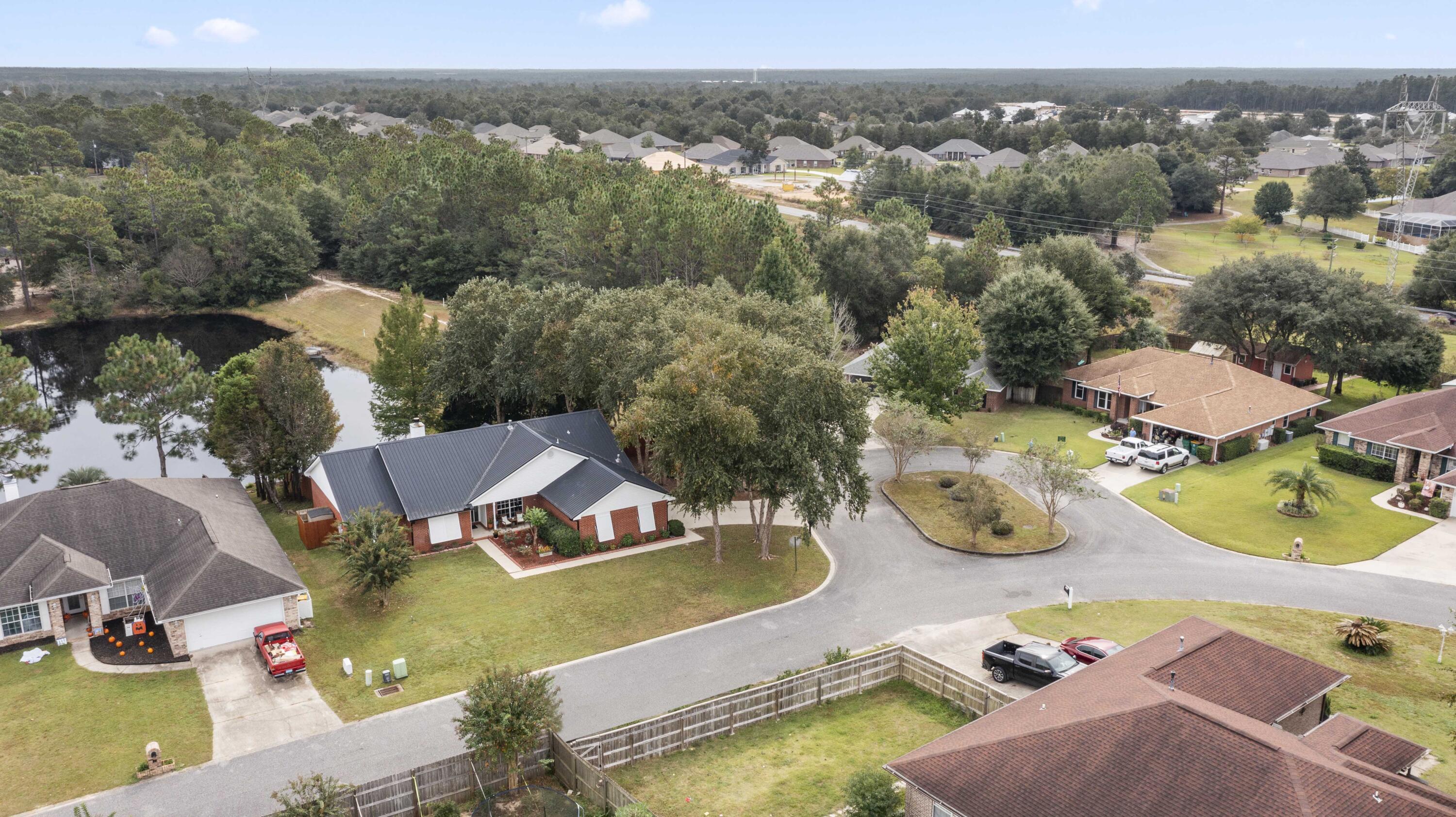 2852 Atoka Trail Crestview, FL 32539 - Photo 12 of 45 an aerial view of a house with swimming pool
