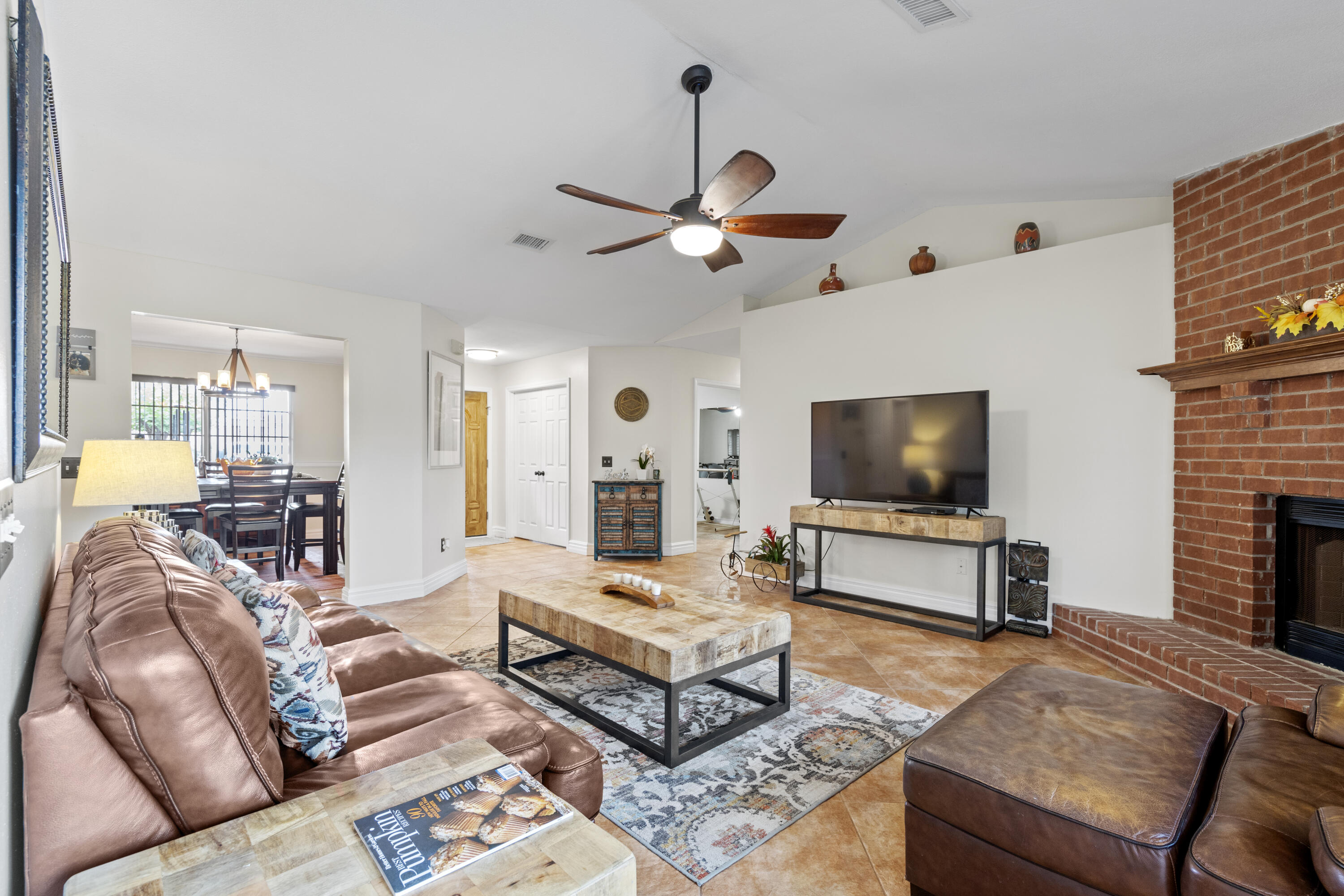 2852 Atoka Trail Crestview, FL 32539 - Photo 14 of 45 a living room with furniture and a flat screen tv