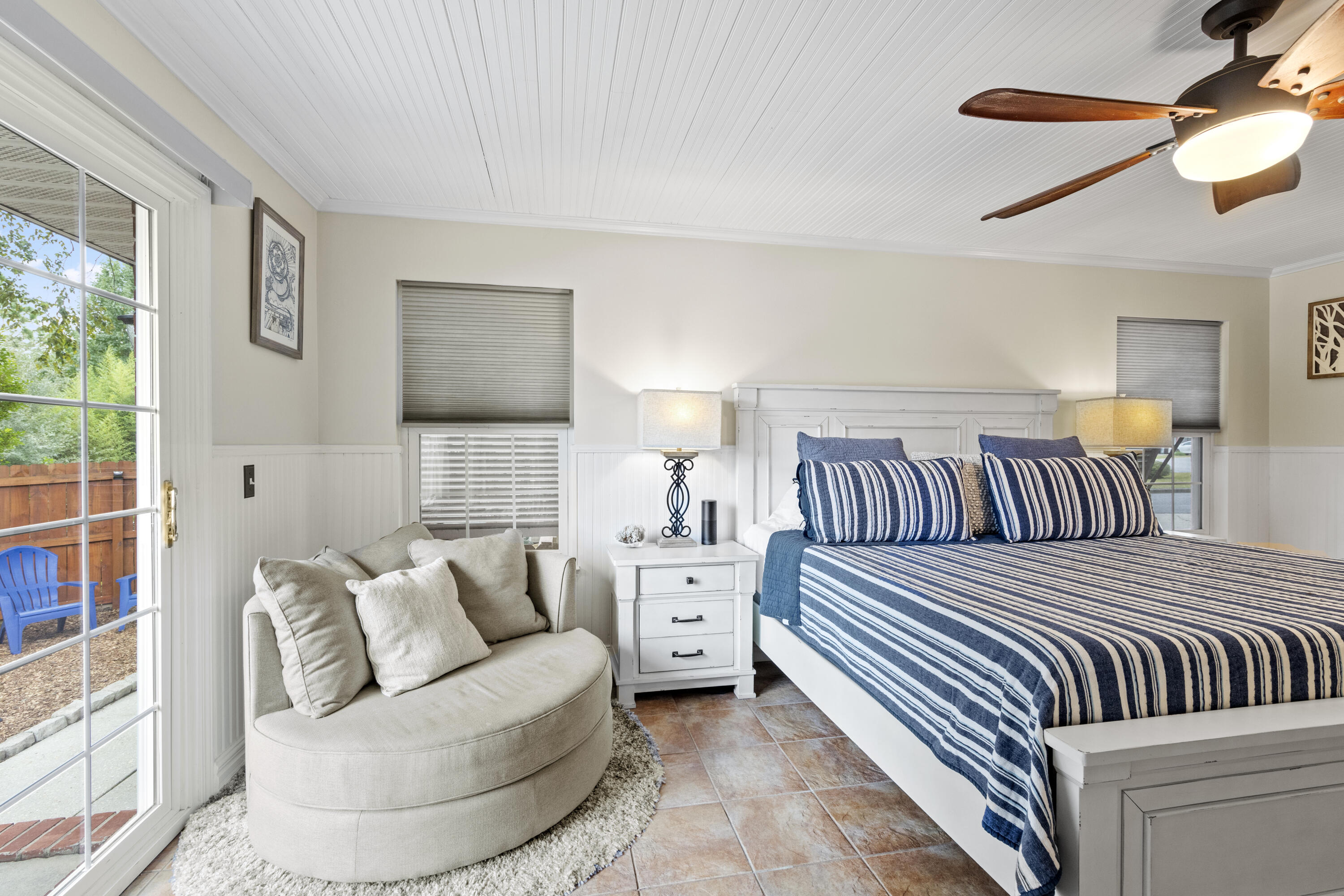 2852 Atoka Trail Crestview, FL 32539 - Photo 27 of 45 a bedroom with furniture and a large window