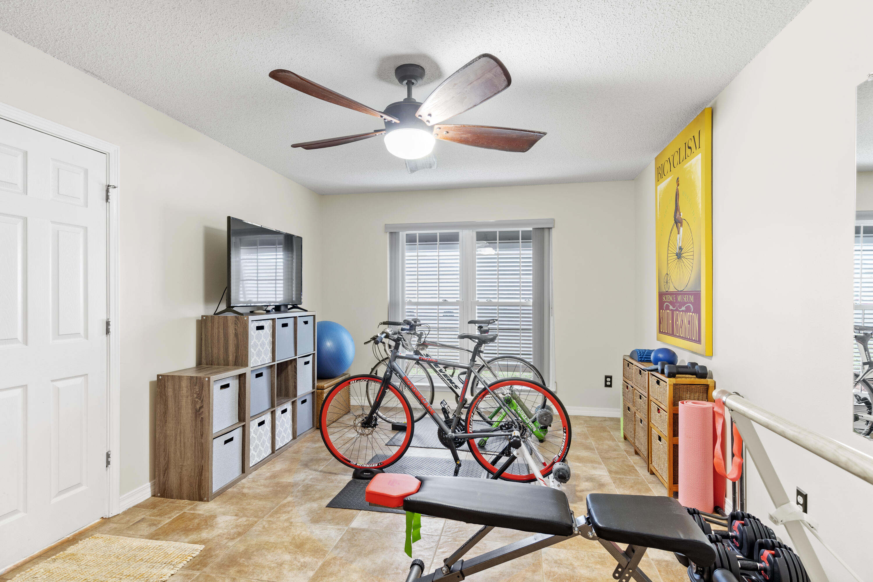 2852 Atoka Trail Crestview, FL 32539 - Photo 33 of 45 a view of a dining room with furniture window and wooden floor