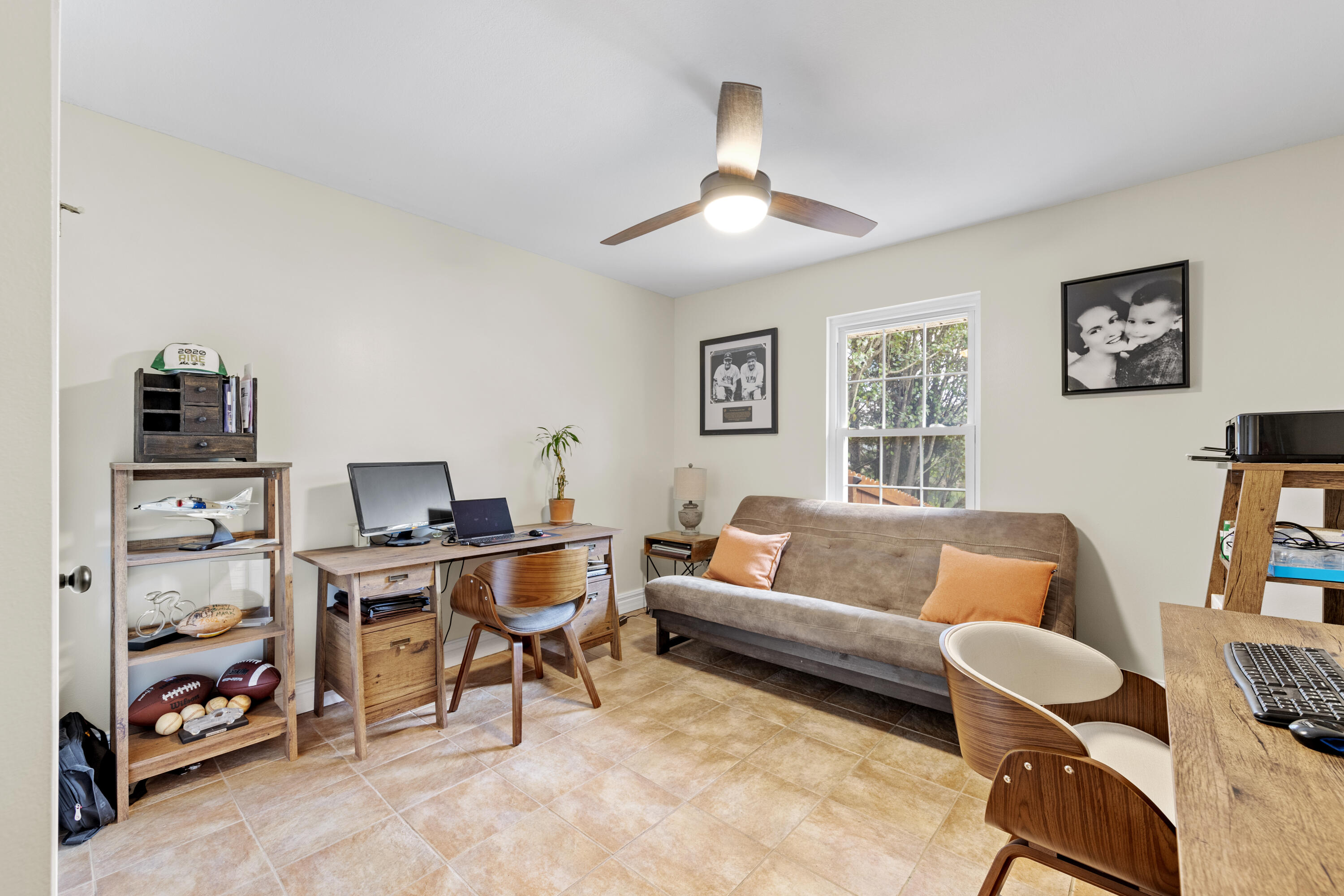 2852 Atoka Trail Crestview, FL 32539 - Photo 40 of 45 a living room with furniture and a flat screen tv