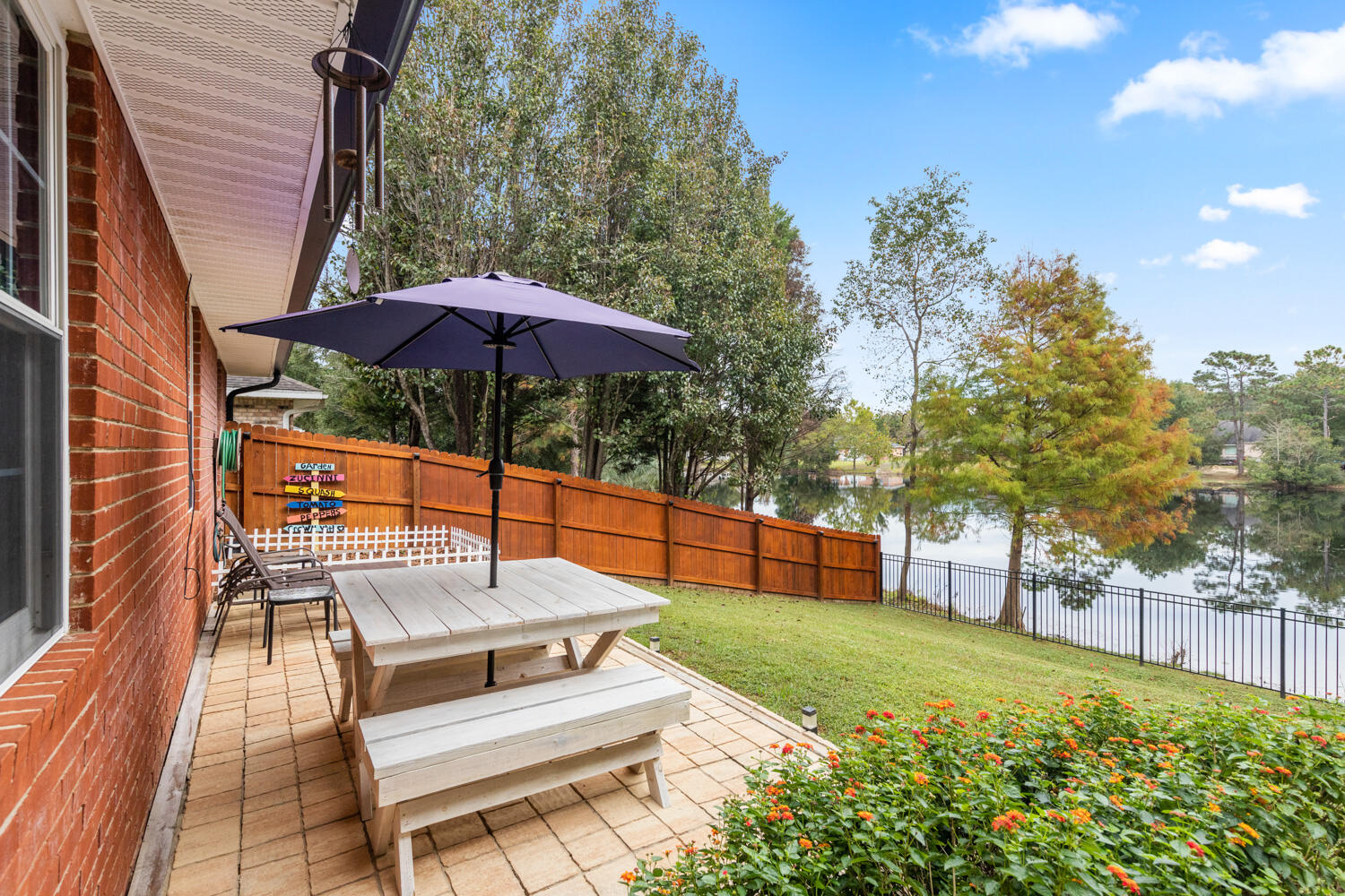 2852 Atoka Trail Crestview, FL 32539 - Photo 7 of 45 a view of a backyard with sitting area