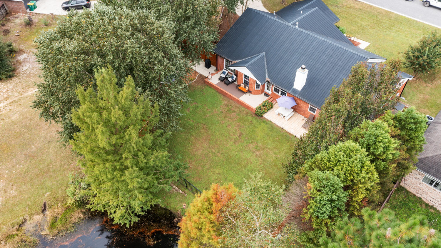 2852 Atoka Trail Crestview, FL 32539 - Photo 10 of 45 an aerial view of a house with a yard and garden