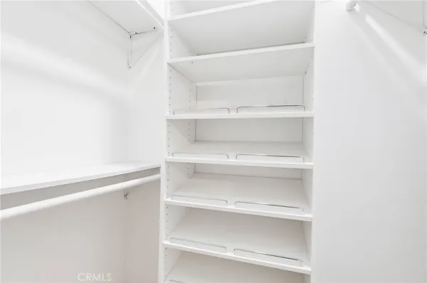 a view of an empty walk in closet