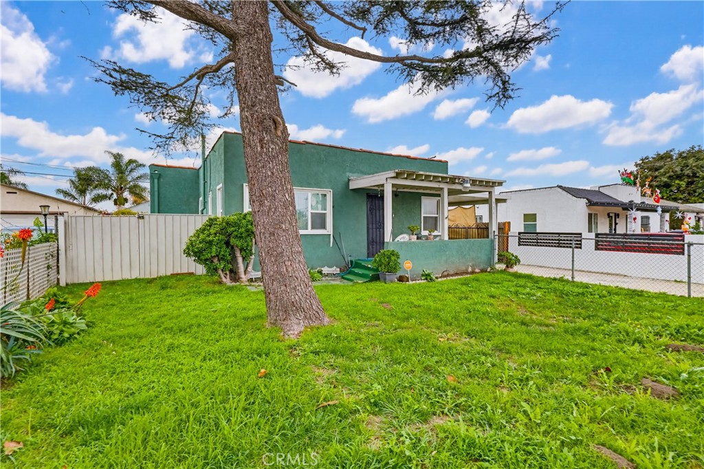 924 West 134th Place Compton, CA 90222 - Photo 8 of 45 a view of a house with a backyard