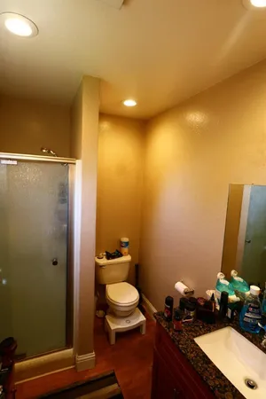 a bathroom with a toilet and a sink