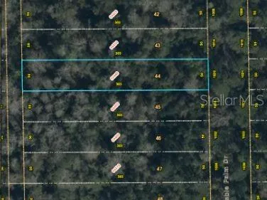 a bathroom with a wooden shelf