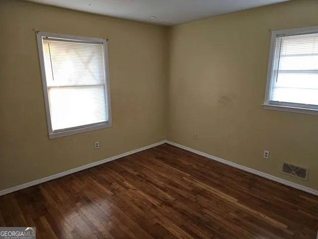 an empty room with a window