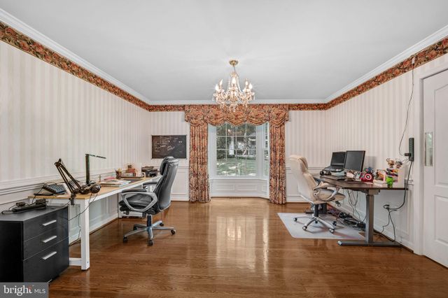 a workspace with wooden floor
