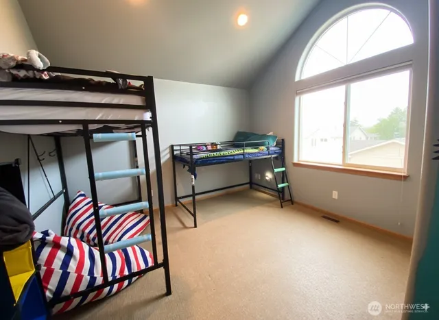 a room with furniture and a window