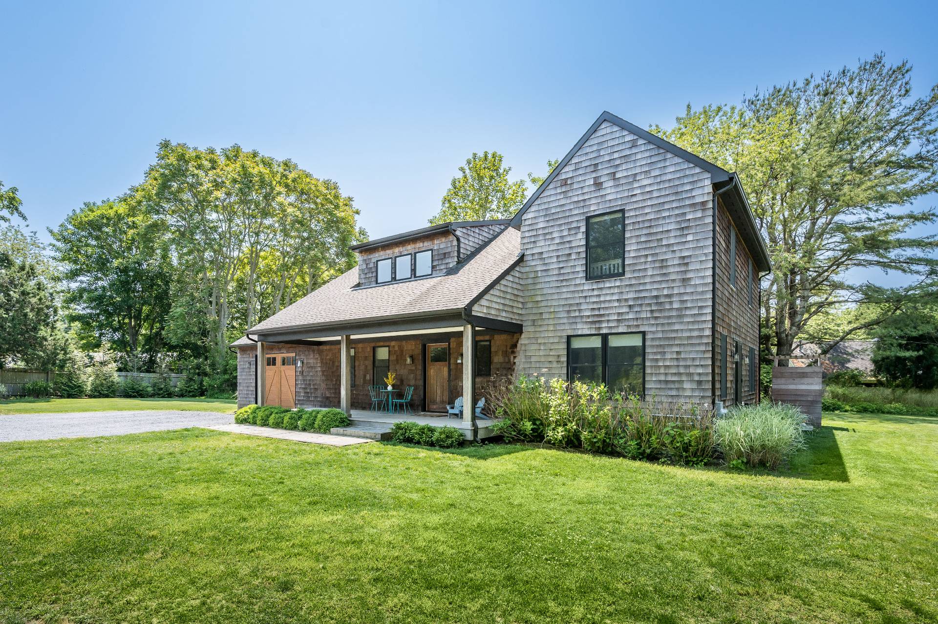 87 Accabonac Road East Hampton, NY 11937 - Photo 14 of 20 a view of a house with a backyard