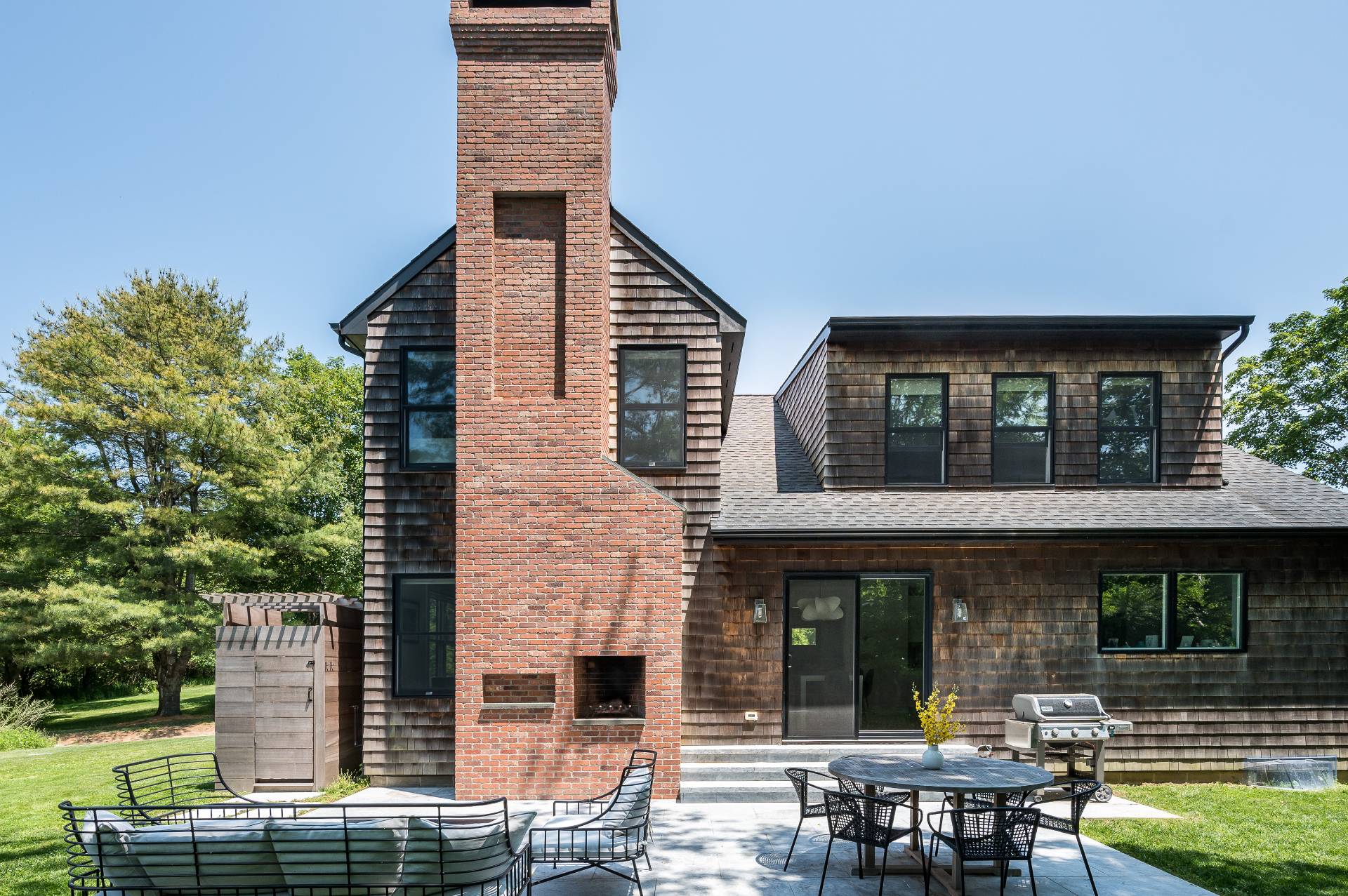 87 Accabonac Road East Hampton, NY 11937 - Photo 16 of 20 a view of house with outdoor seating area