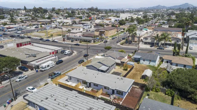 an aerial view of a city with lots of residential buildings