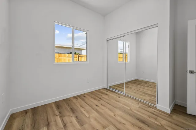 a view of an empty room and window