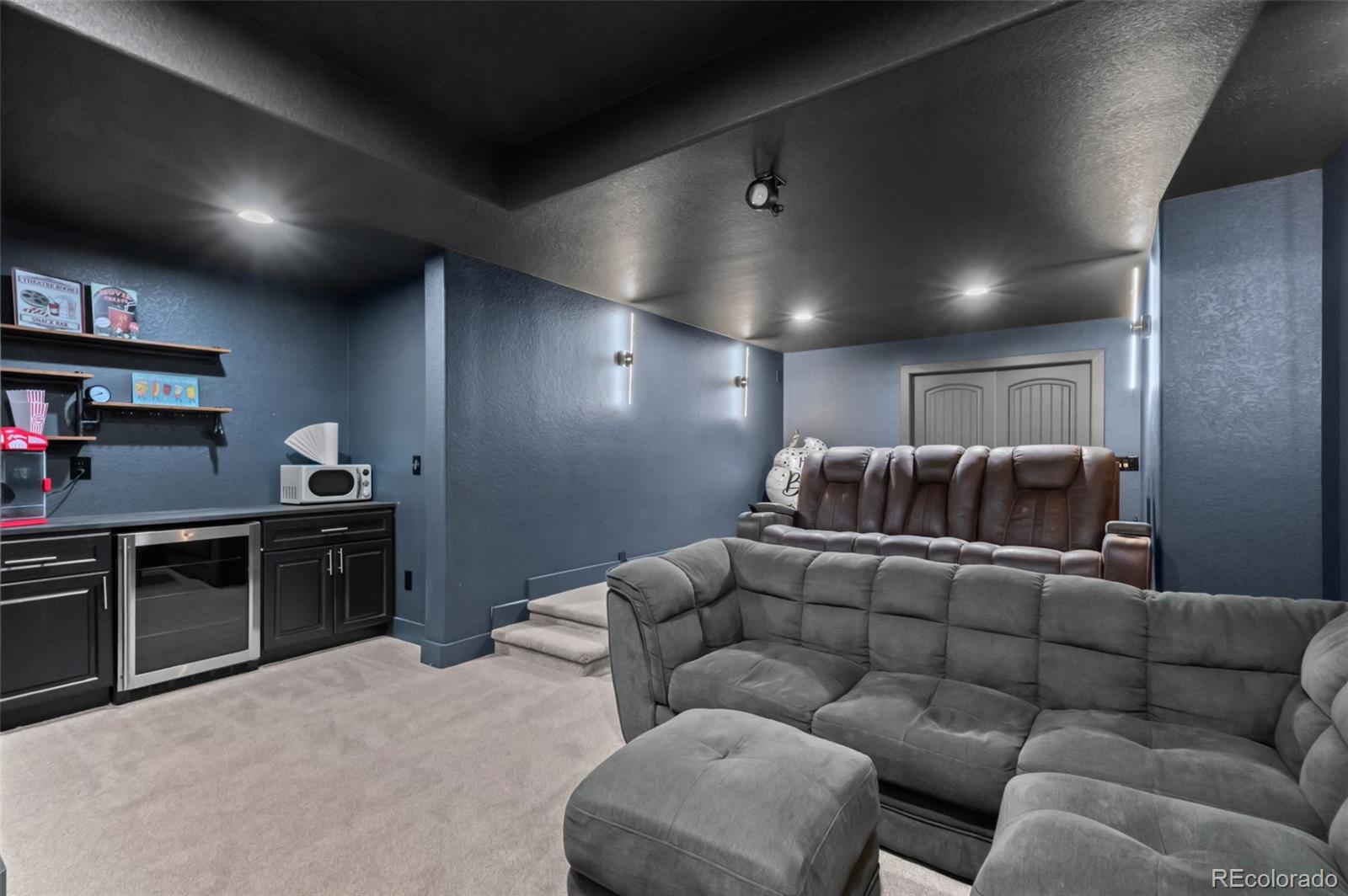 2910 El Nido Way Castle Rock, CO 80108 - Photo 35 of 50 a living room with furniture a ceiling fan and a window