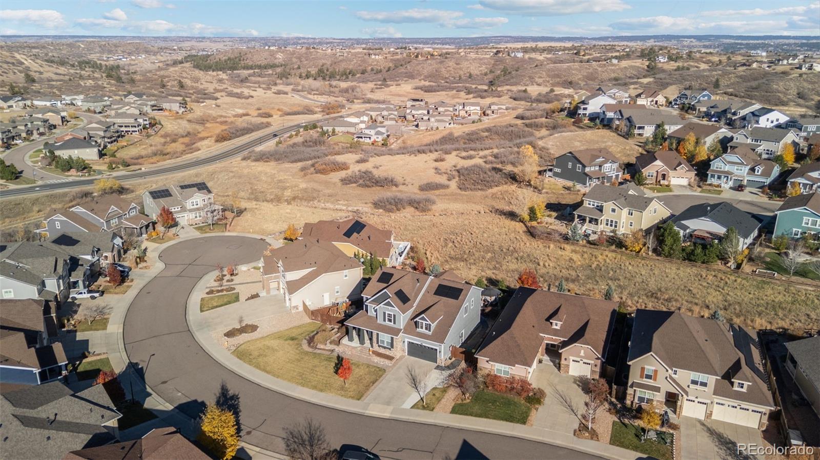 2910 El Nido Way Castle Rock, CO 80108 - Photo 45 of 50 an aerial view of a livingroom with a dinning table and chairs